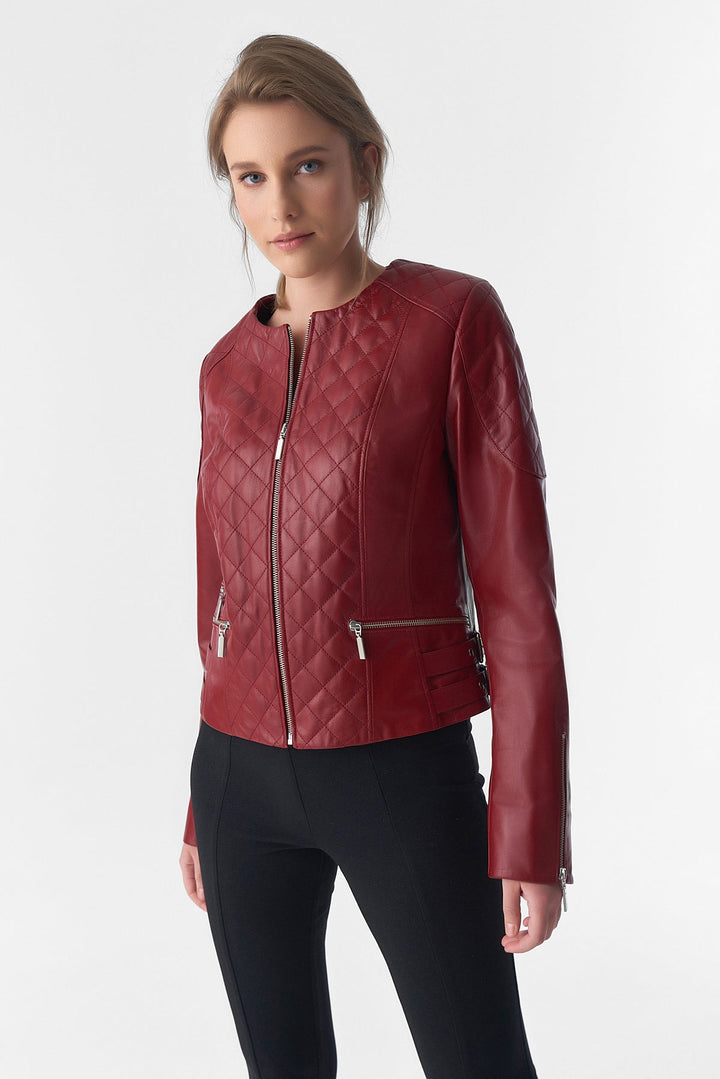 Woman wearing red quilted leather jacket
