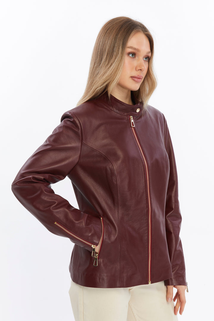 Woman wearing burgundy leather jacket