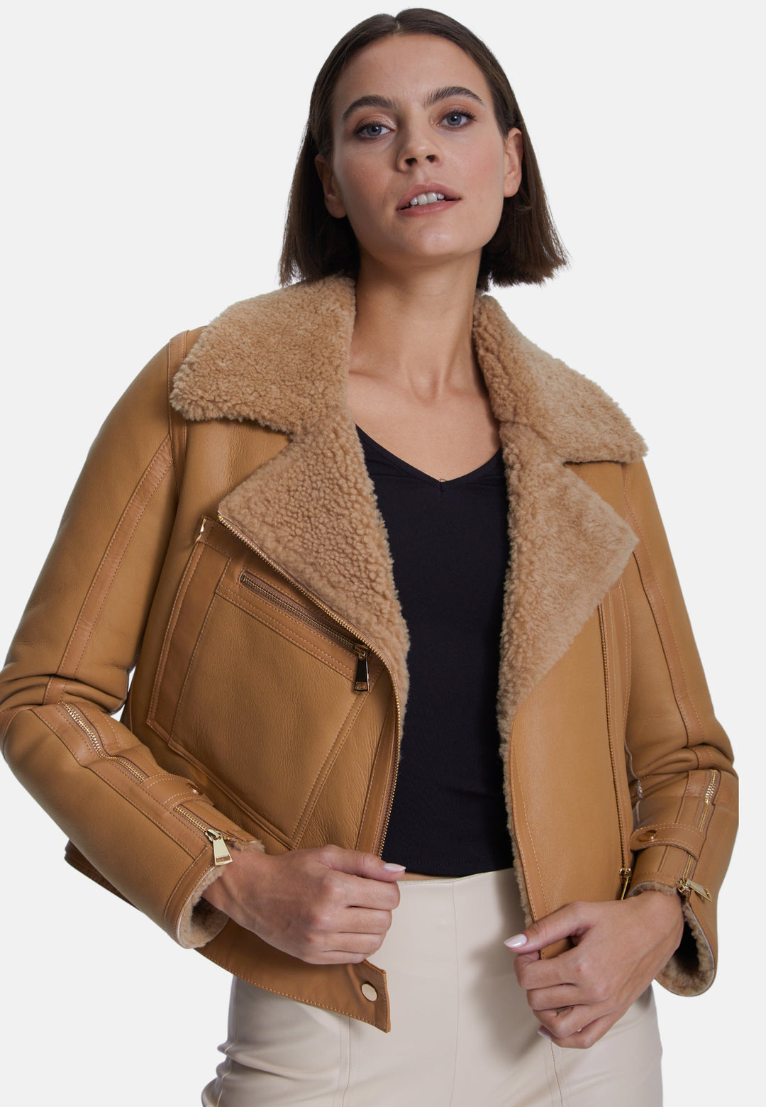 Beige sheepskin jacket on model