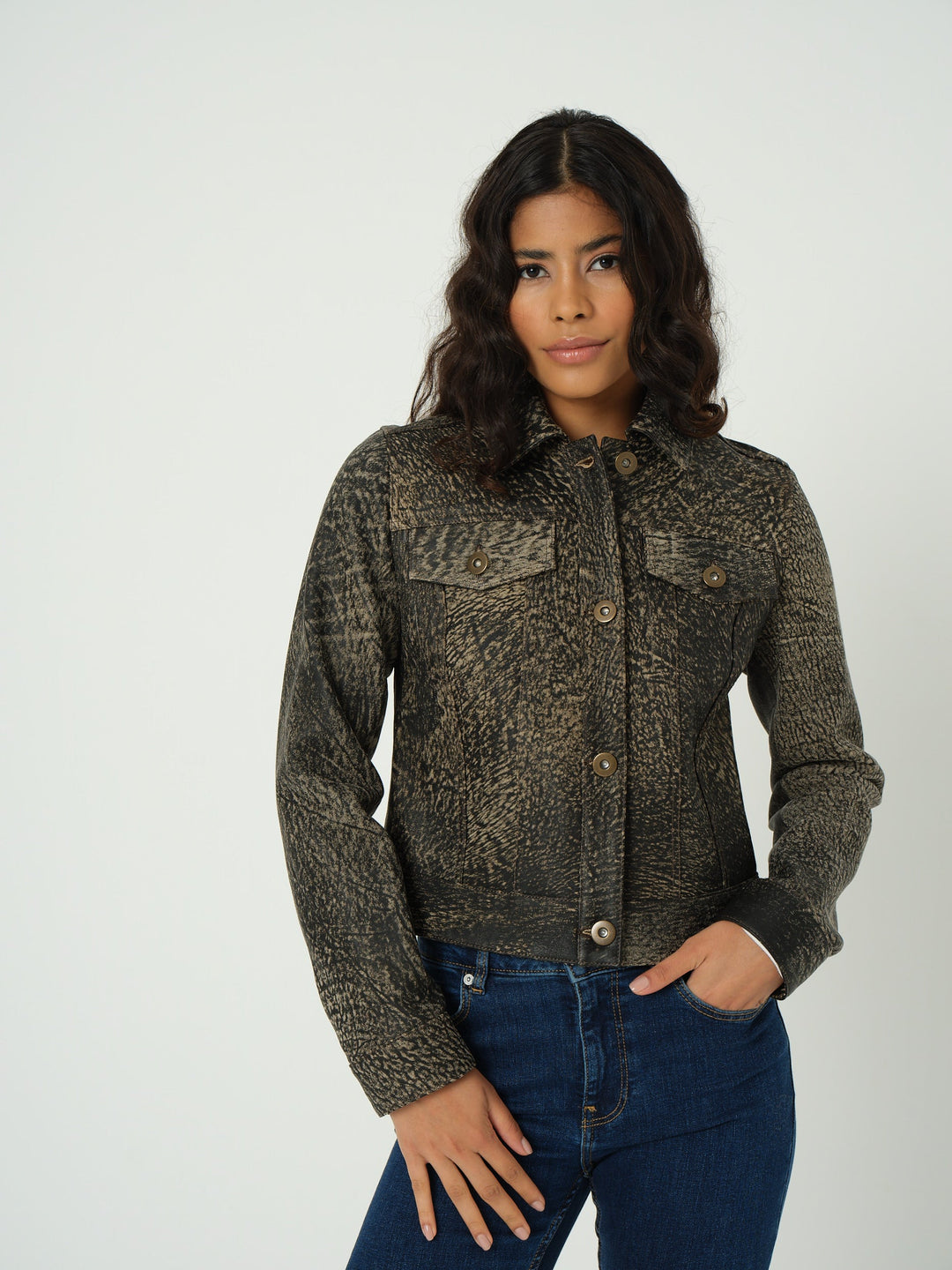 Woman wearing textured olive leather jacket