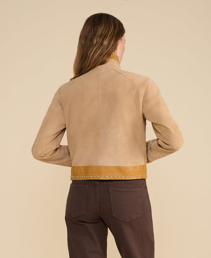 Back of beige suede studded jacket