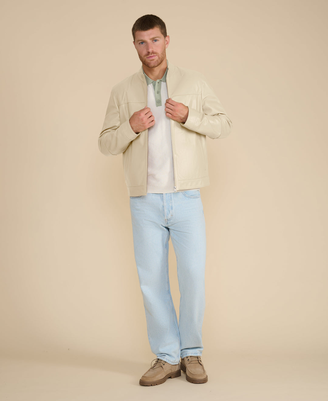 Beige racer leather jacket on model