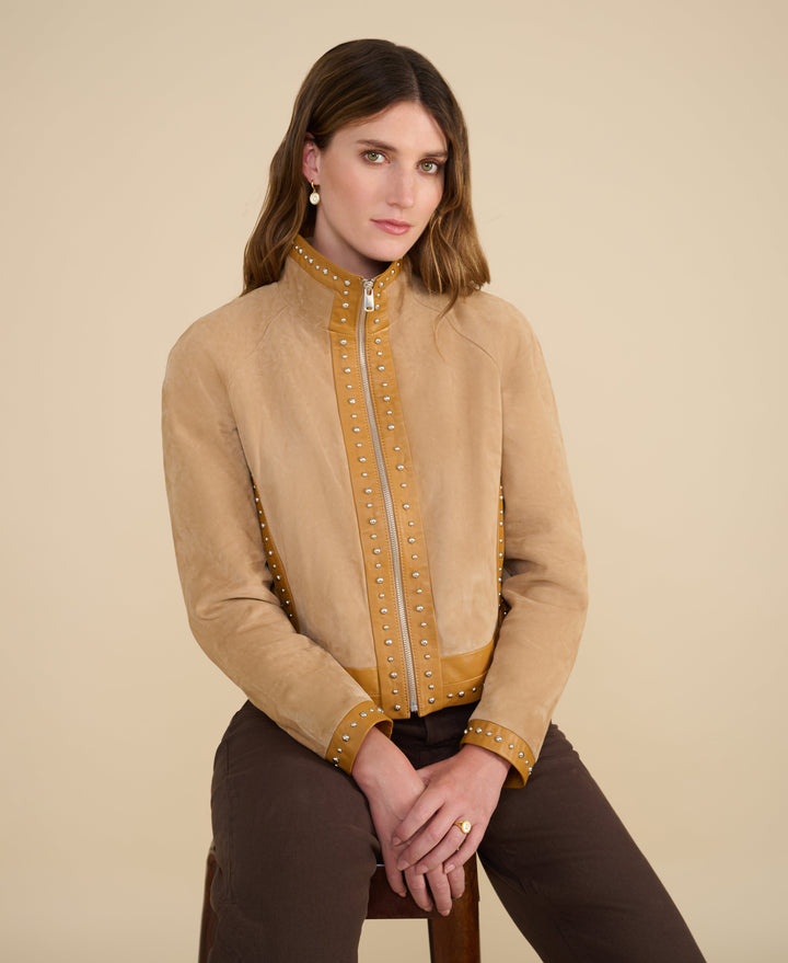 Tan suede studded jacket on model