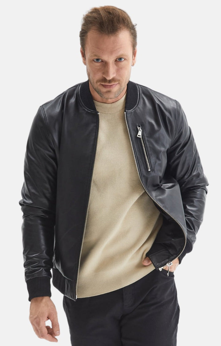 Man wearing black leather bomber jacket