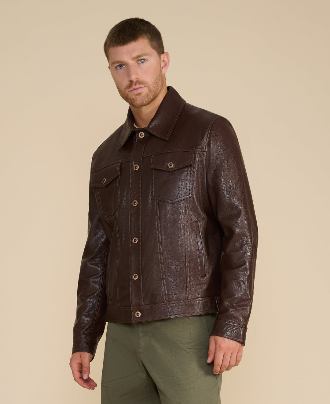 Man wearing dark brown leather jacket