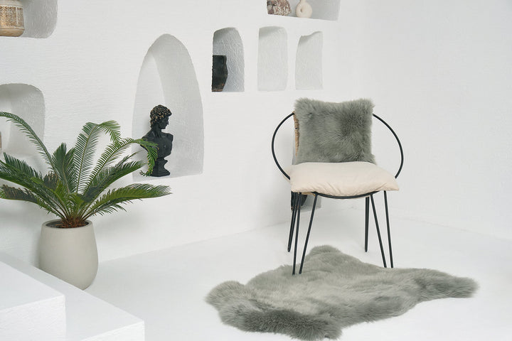 Light green sheepskin rug with chair
