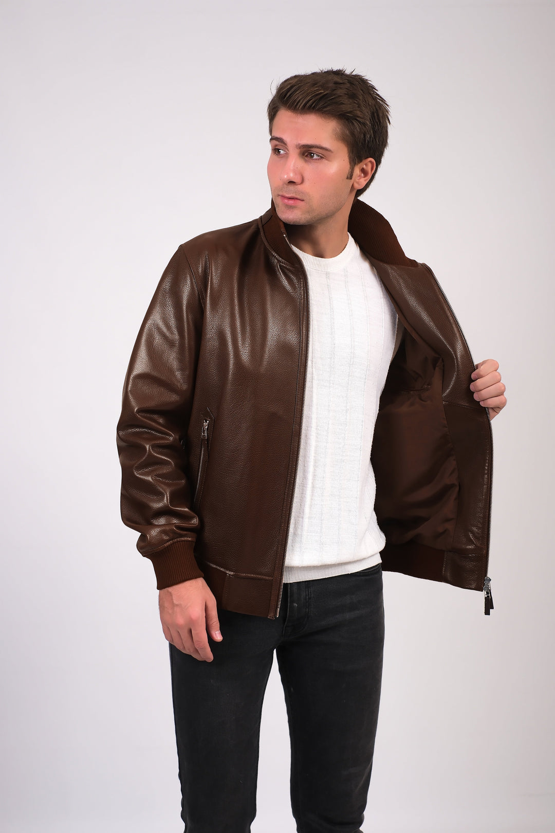 Man wearing brown leather jacket