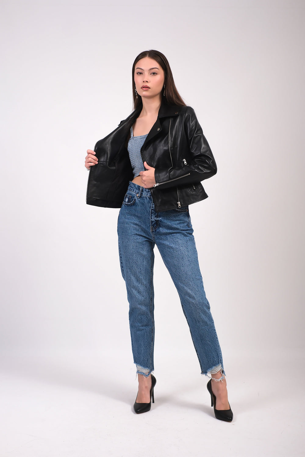 Charlotte black leather biker jacket styled with blue jeans