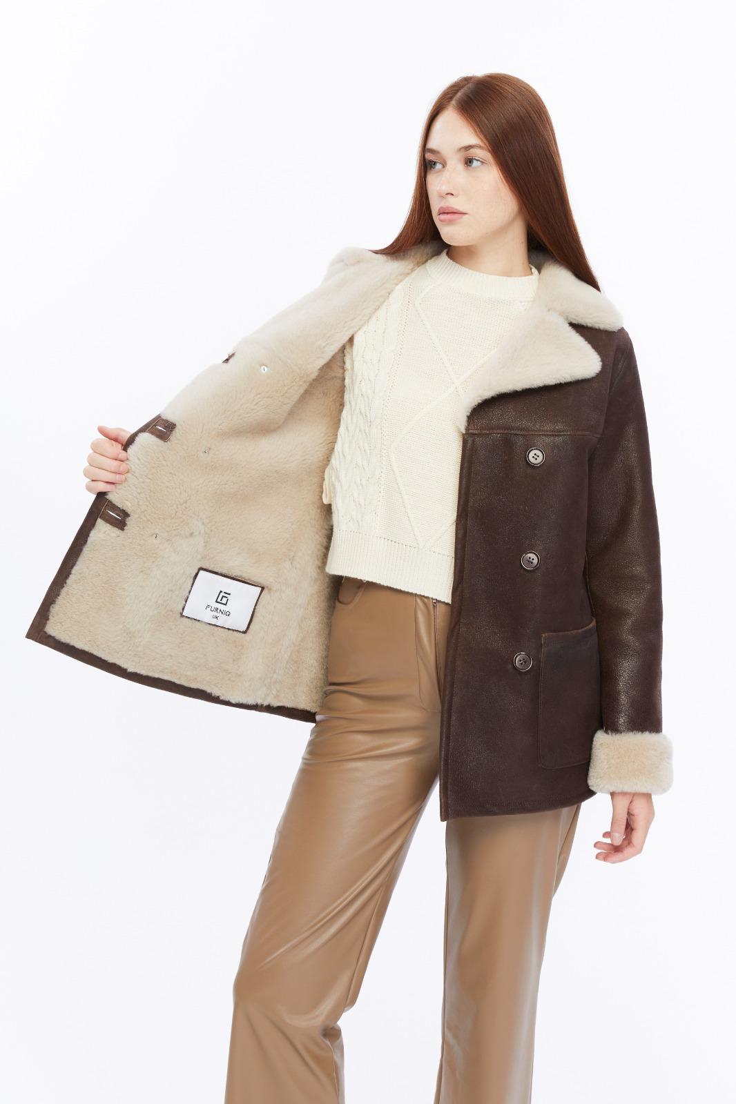 Chelsea vintage brown peacoat opened to show its fully lined cream shearling interior