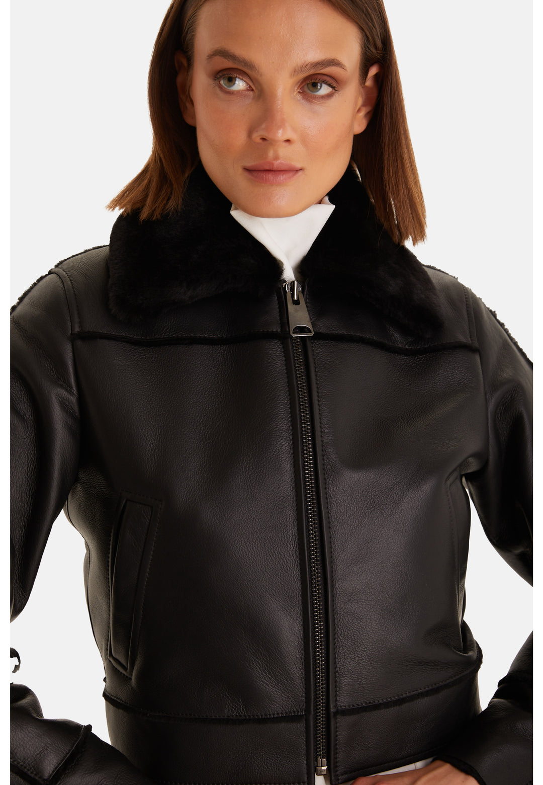Close-up of Clara black leather jacket and straight shearling collar
