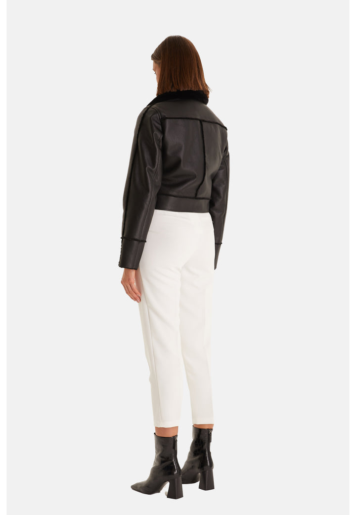 Back view of Clara black leather jacket with tonal shearling detailing