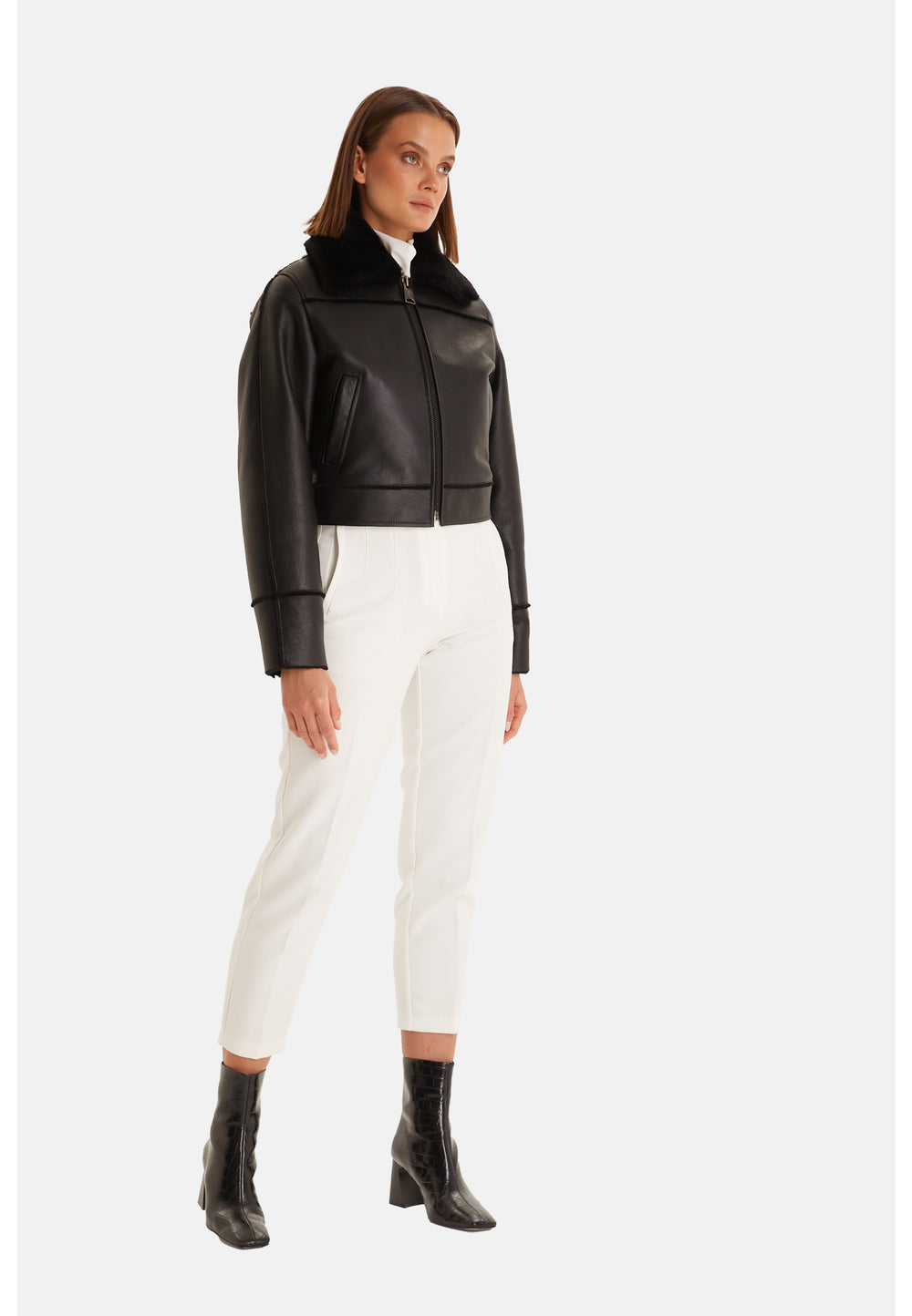 Side view of Clara black leather and straight shearling jacket