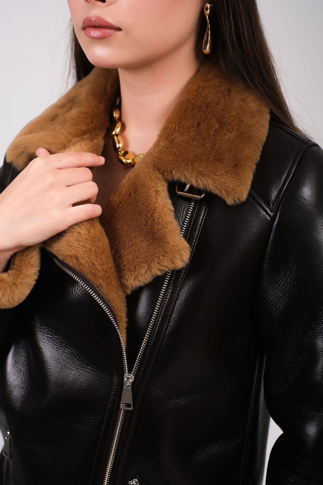 Black shearling jacket with brown collar
