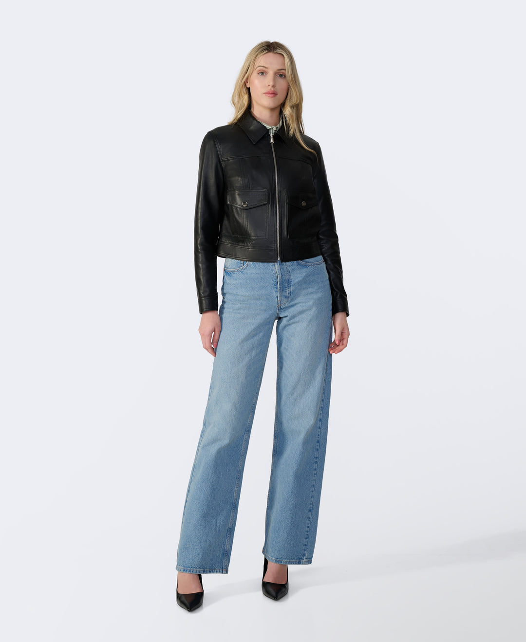 Black leather zip jacket on model