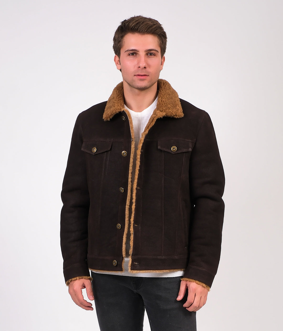 Man wearing brown shearling jacket