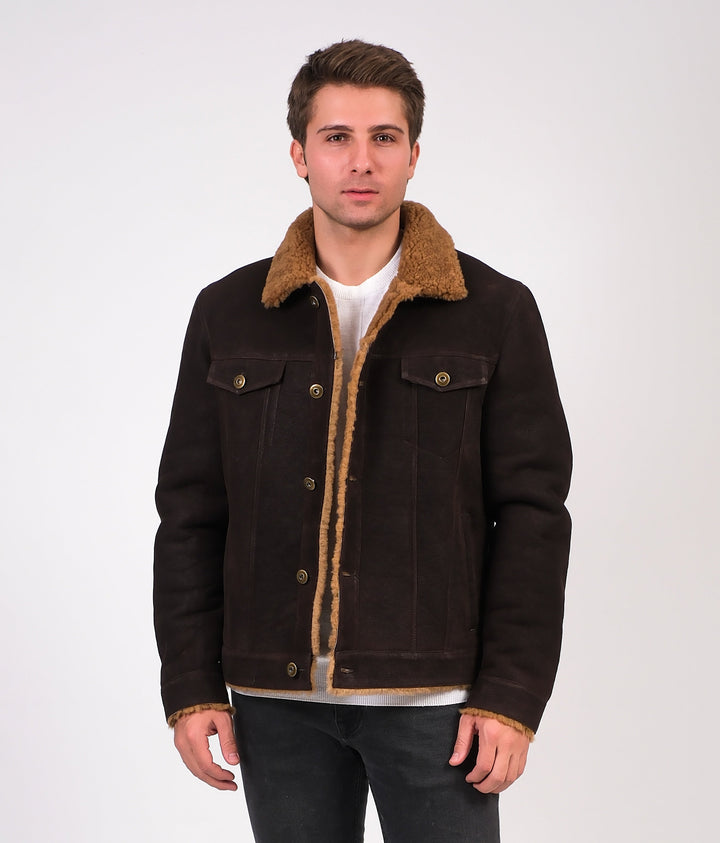 Man wearing brown shearling jacket