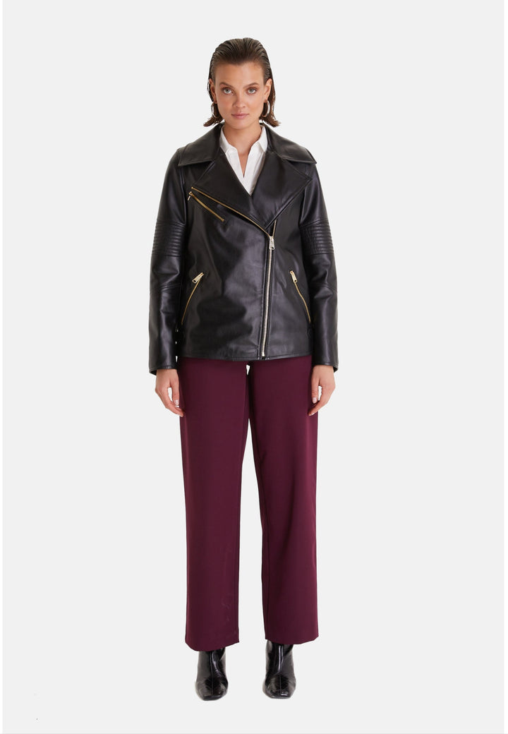 Woman wearing black leather jacket