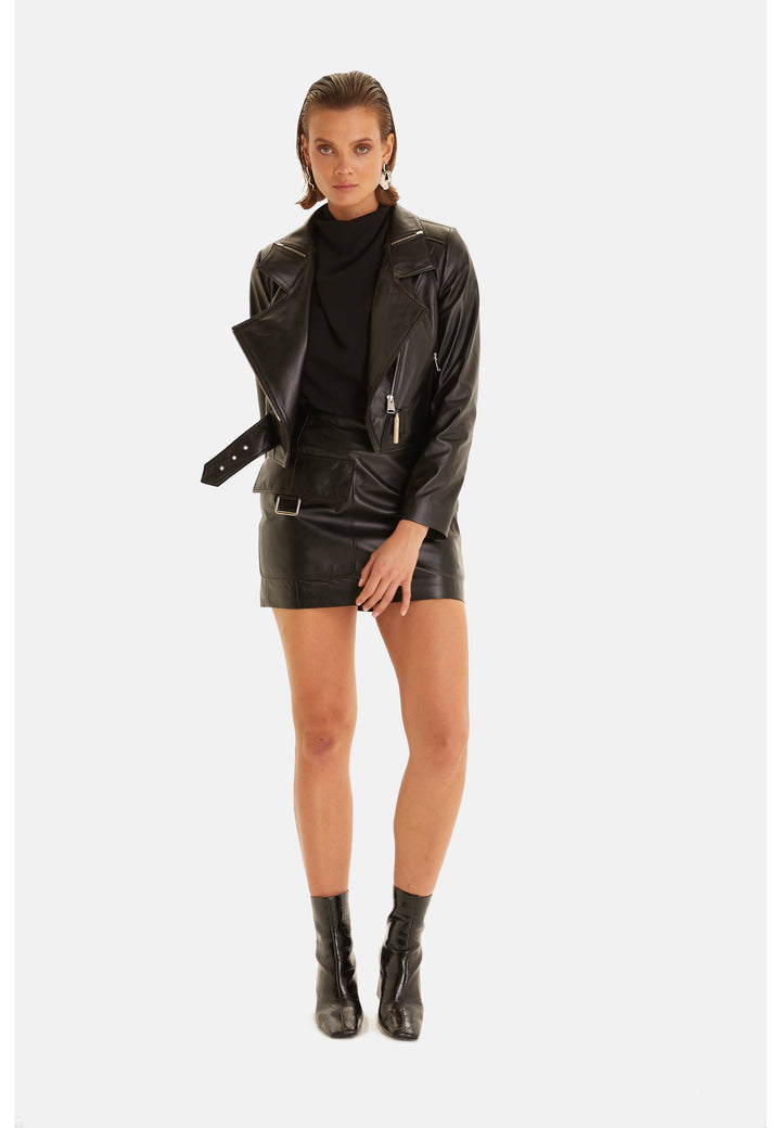 Woman wearing black leather jacket outfit