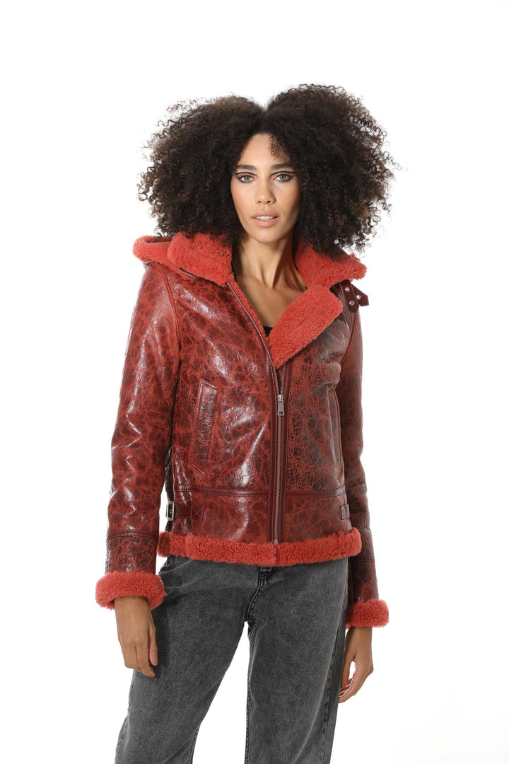 Woman wearing red shearling jacket