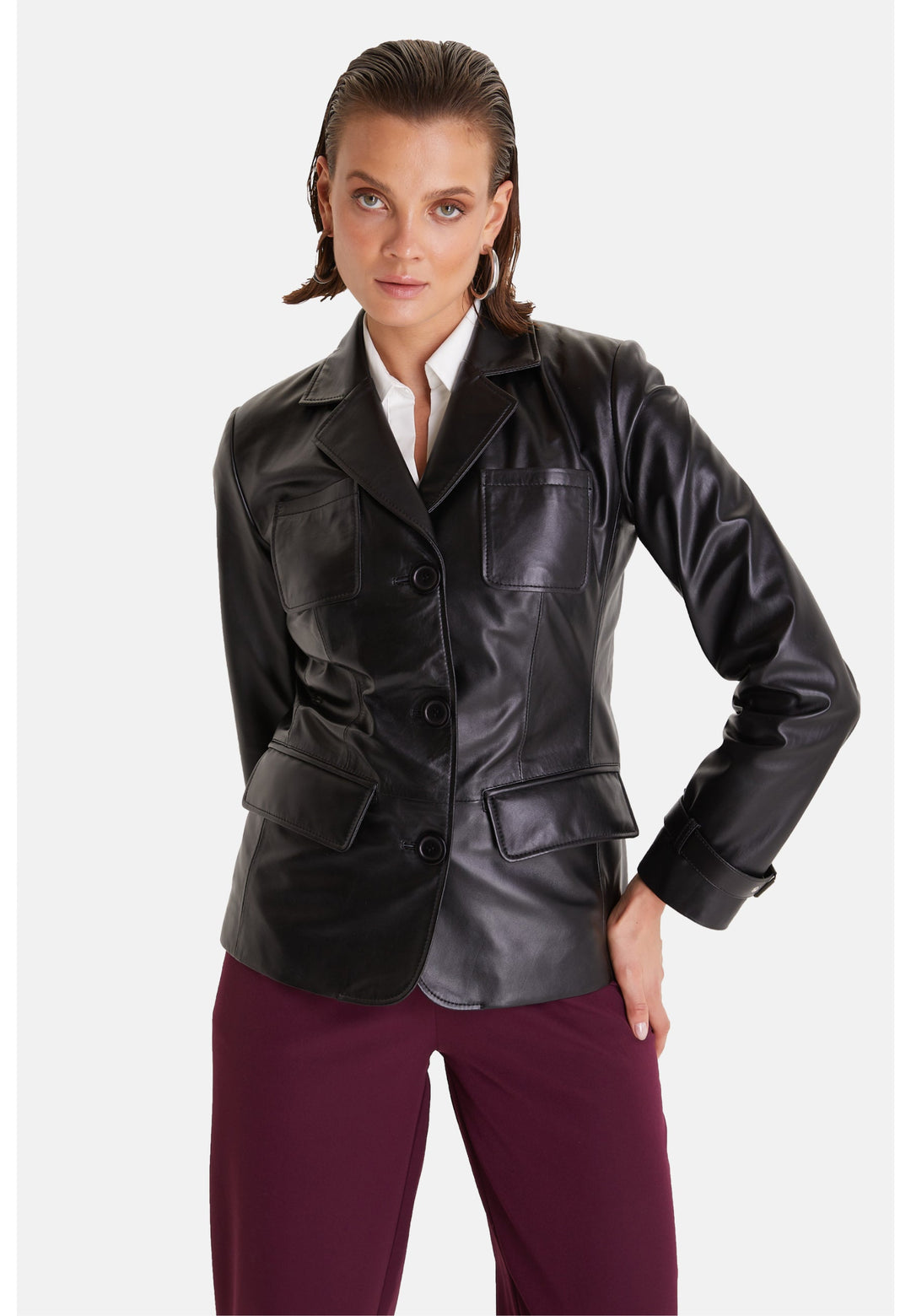 Woman wearing black leather blazer jacket