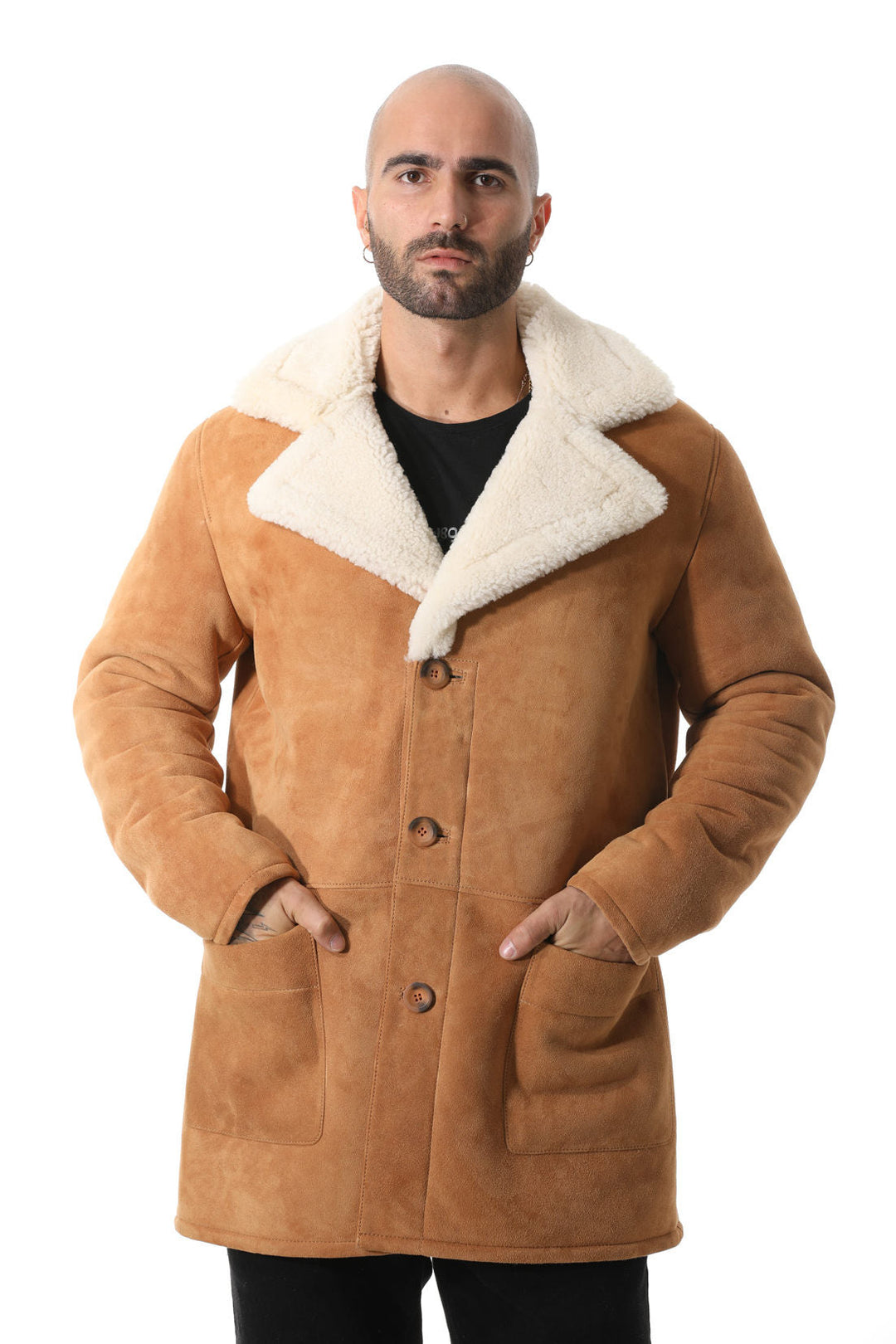 Man wearing tan sheepskin coat