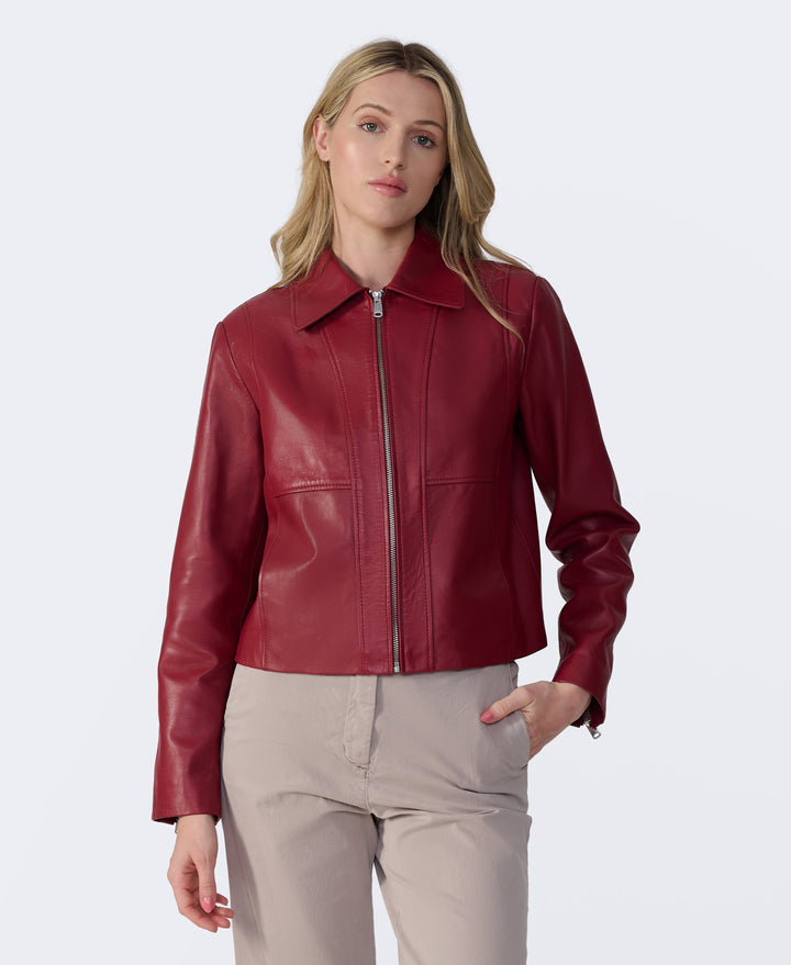 Angled front view of Daisy light burgundy leather jacket crafted from 100% British leather