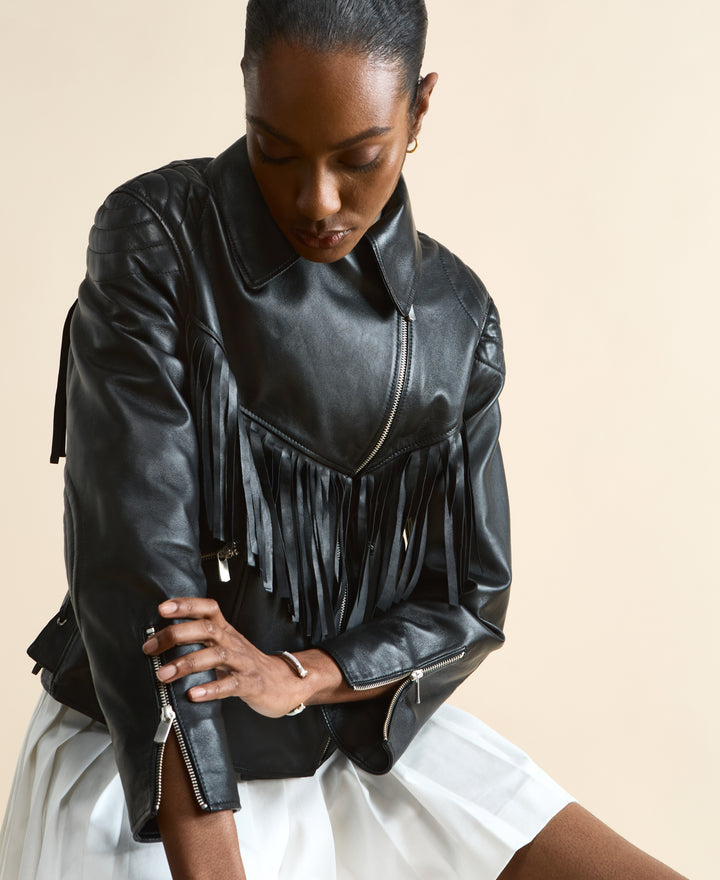 Detail view of Dakota black fringed leather jacket with zip cuff design
