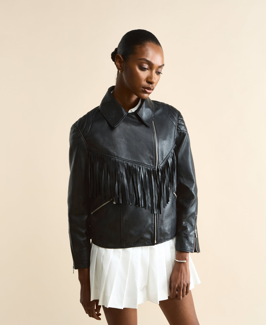 Front view of Dakota black fringed leather jacket with fringe detailing