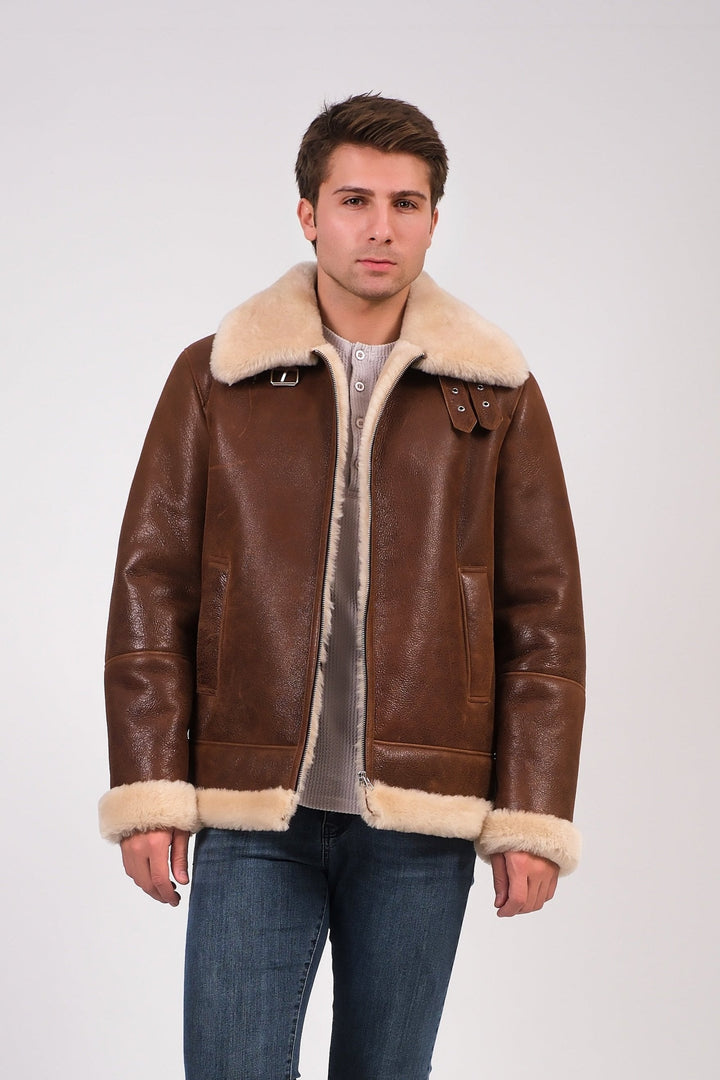 Man wearing brown shearling aviator jacket