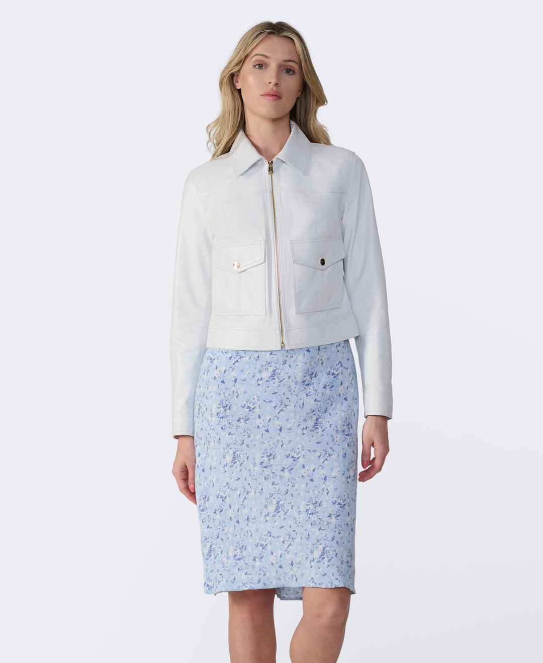 Woman in white leather jacket