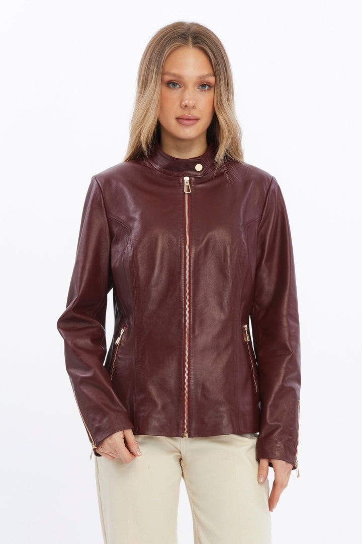 Woman wearing burgundy leather jacket