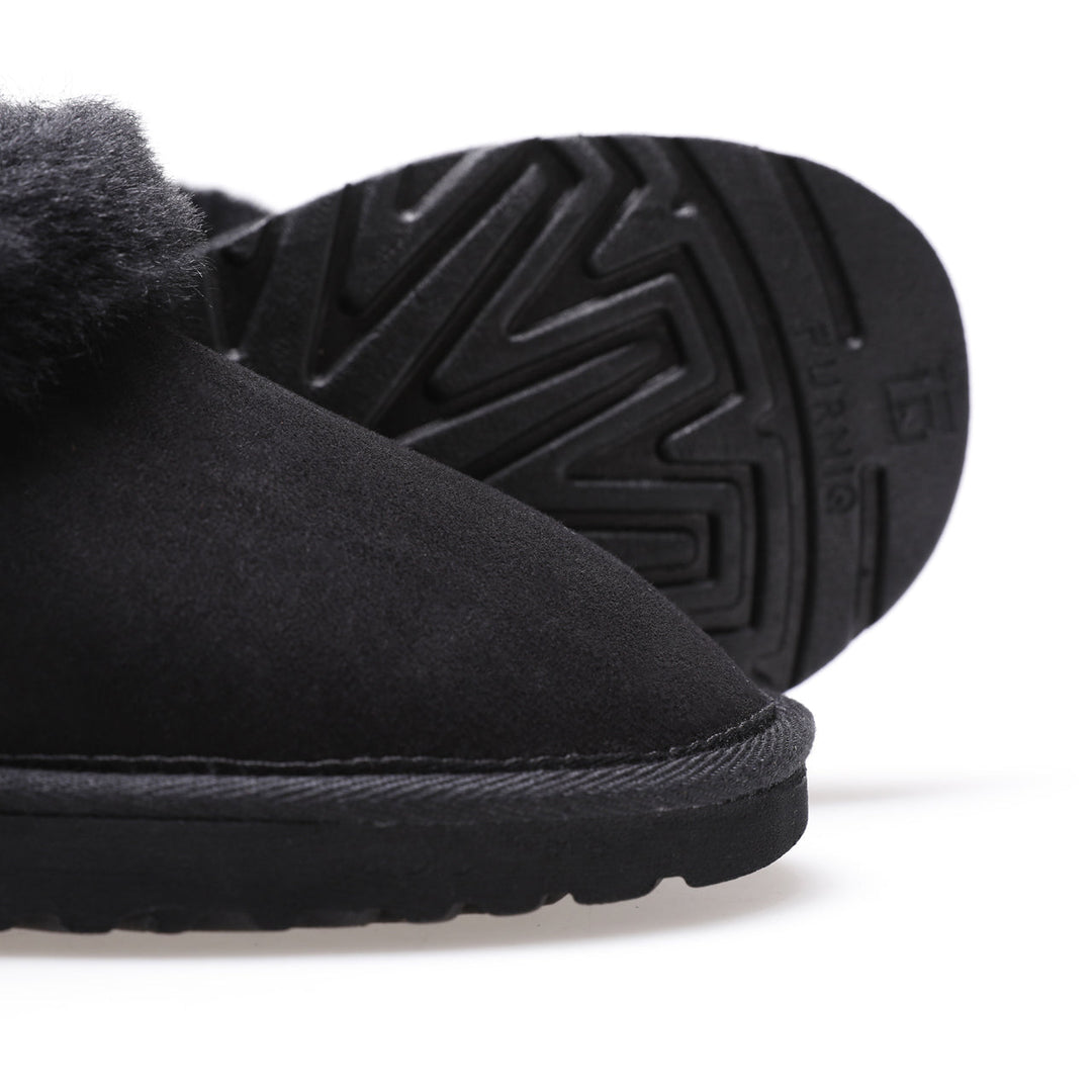 Black suede sheepskin slipper close-up