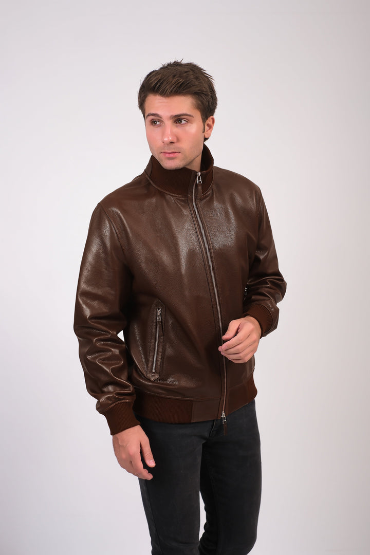 Man wearing brown leather jacket