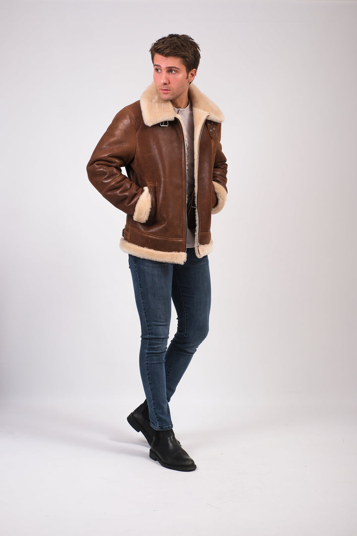 Man wearing brown shearling aviator jacket
