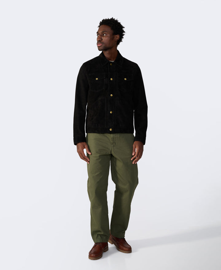 Man wearing black suede jacket