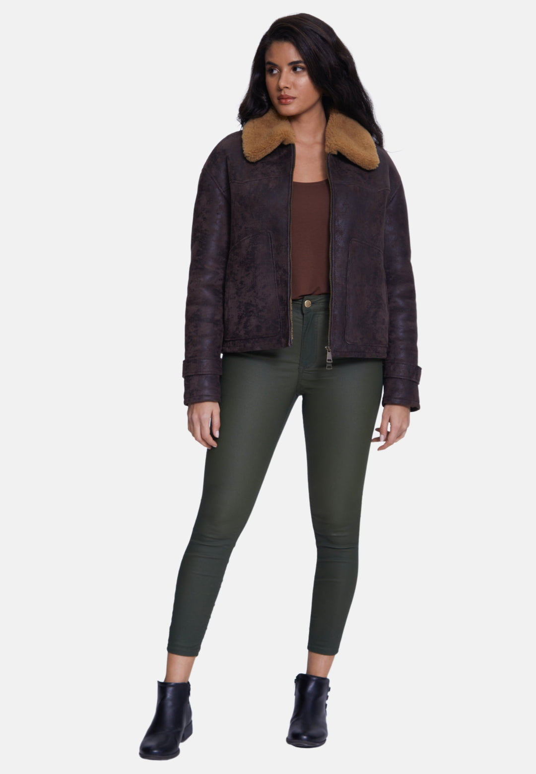 Woman wearing brown sheepskin jacket