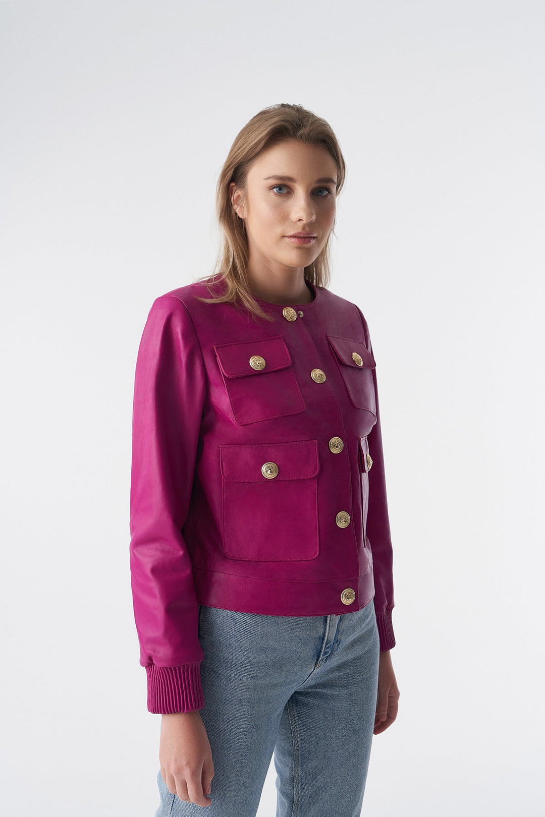 Woman wearing pink leather jacket