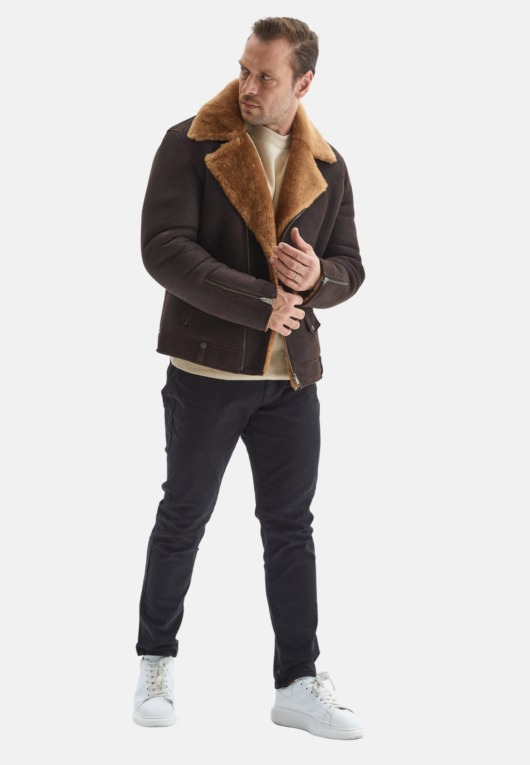 Man wearing brown shearling jacket