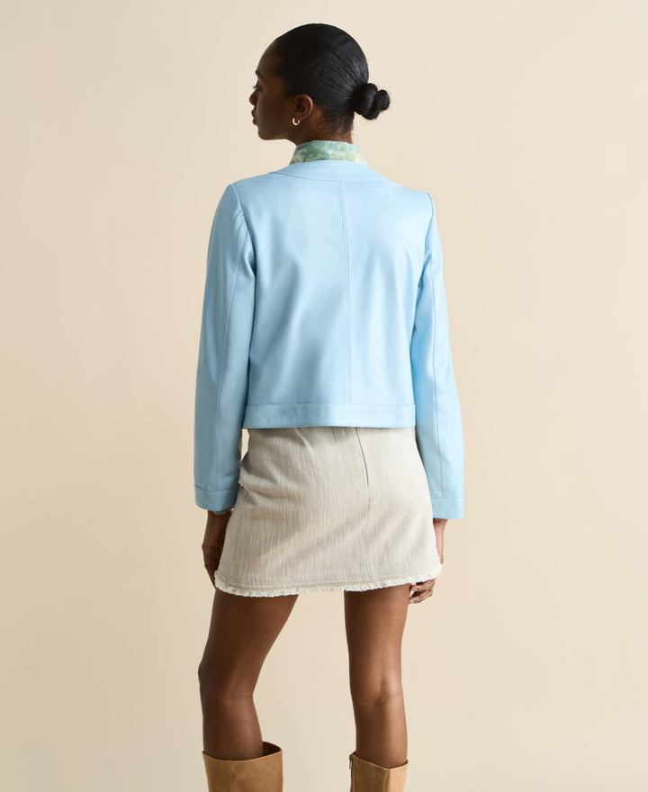Back view light blue leather jacket