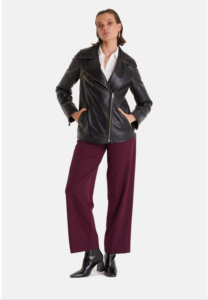 Woman wearing black leather jacket