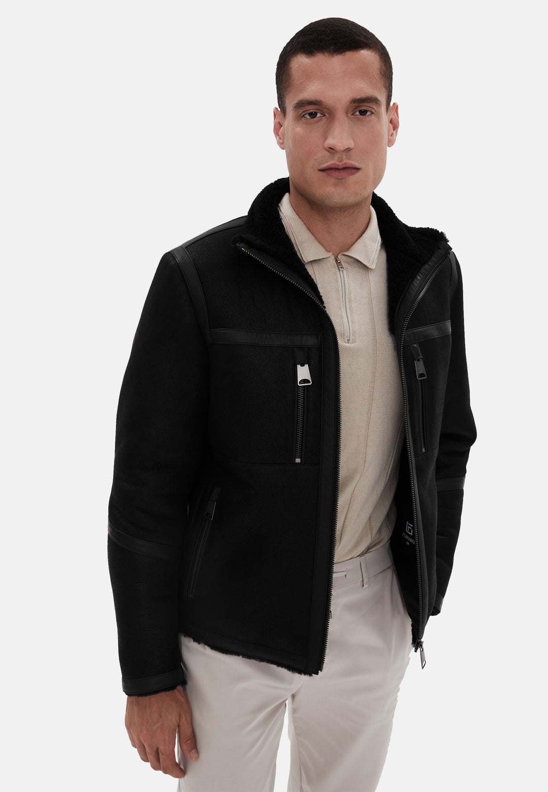 Man wearing black shearling jacket