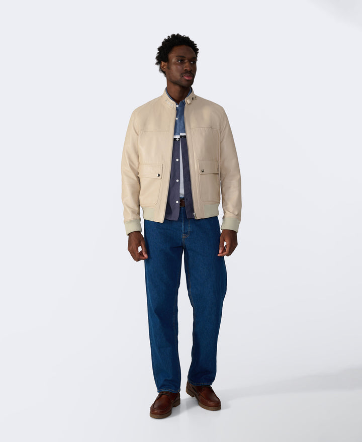 Beige leather jacket on model