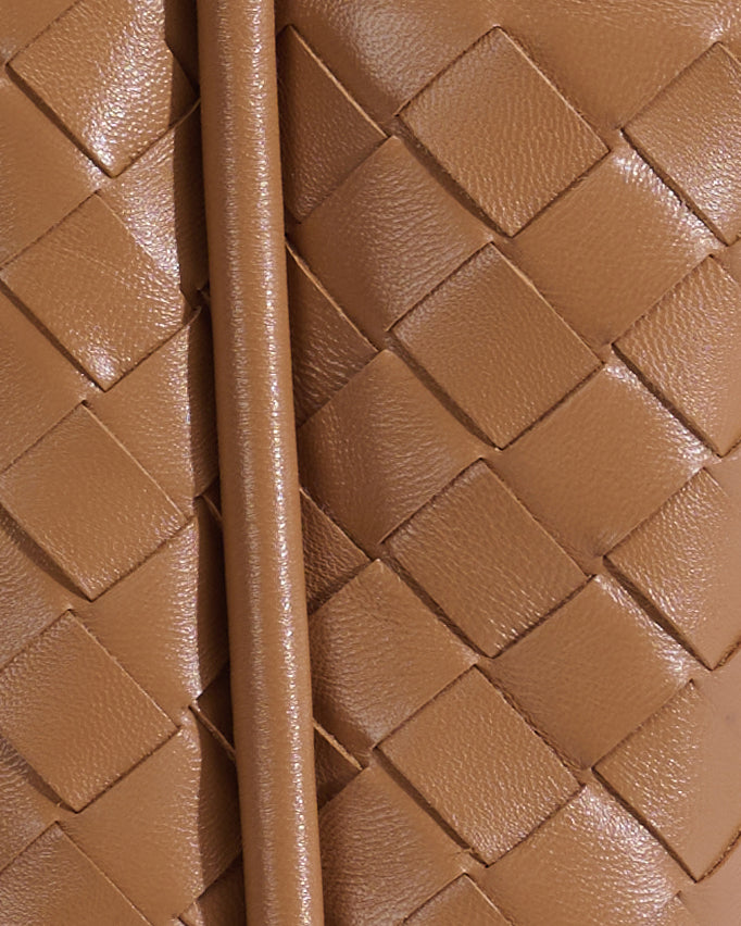 Tan woven leather bag detail