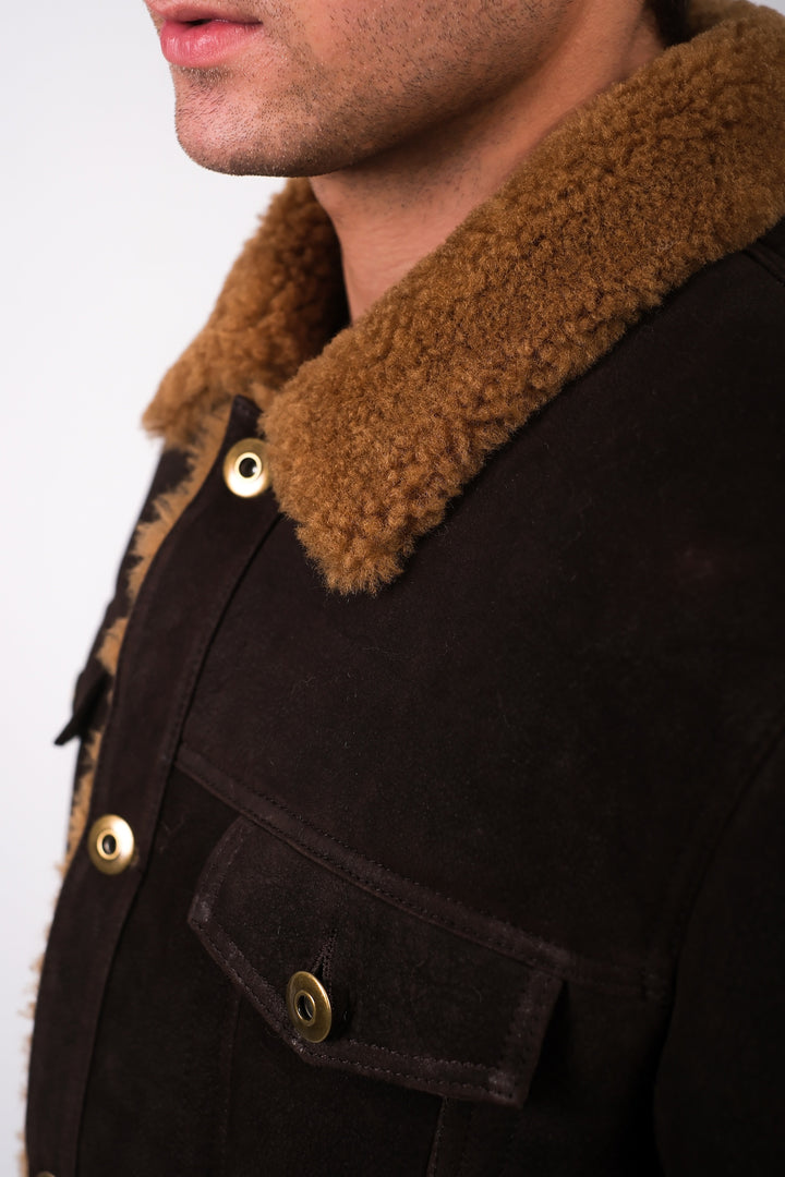 Brown shearling-collar jacket close-up