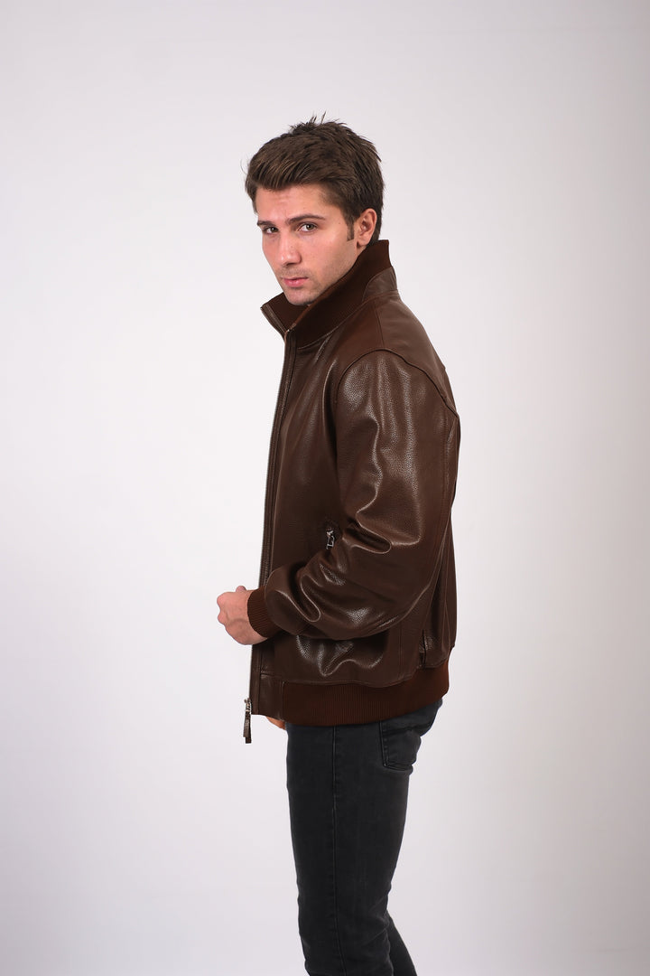 Man wearing brown leather jacket