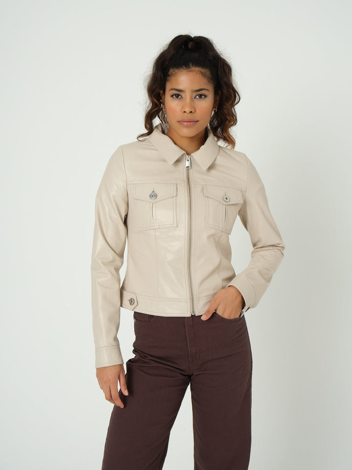 Woman wearing beige leather jacket