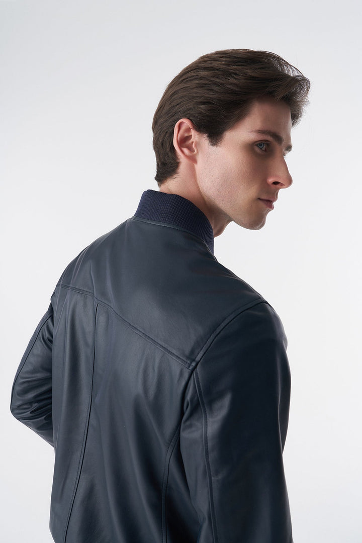 Navy leather jacket on male model