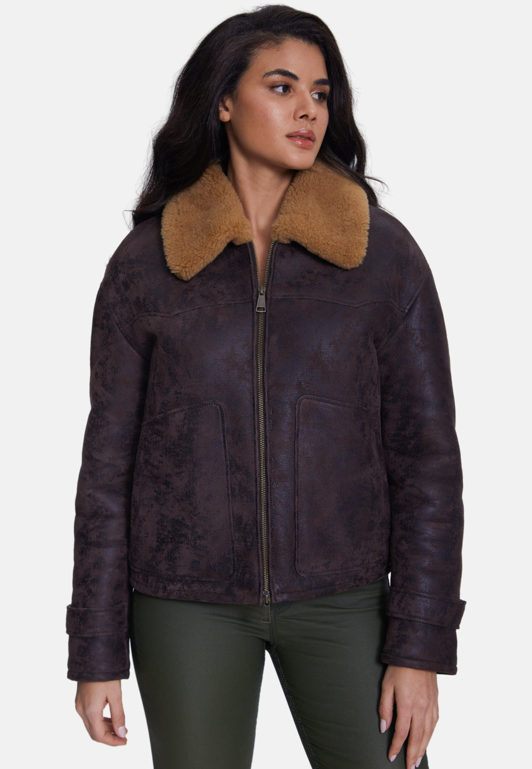 Woman wearing brown sheepskin jacket