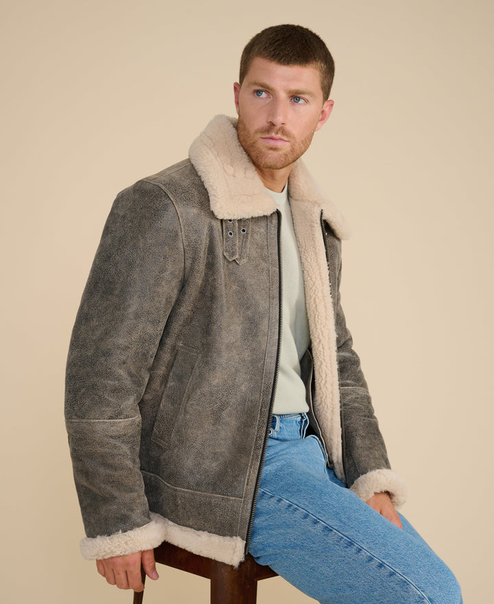 Man wearing shearling aviator jacket