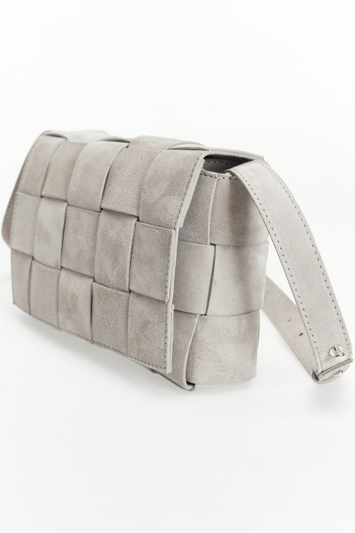 Beige woven suede handbag with strap